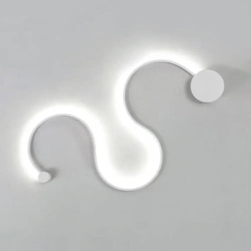 Black White Twist Sconce by Decorbites, modern wall light with a glowing curved loop on Tampa Home & Garden Store