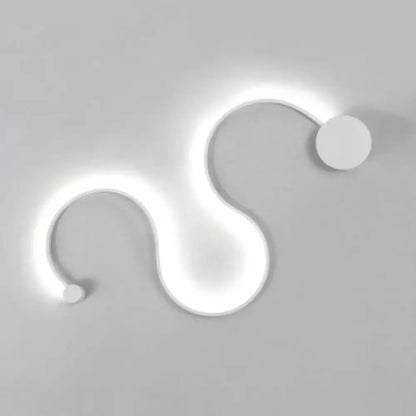 Black White Twist Sconce by Decorbites, modern wall light with a glowing curved loop on Tampa Home & Garden Store