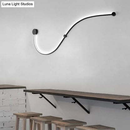 Black White Twist Sconce by Decorbites, modern LED wall light with curved twist on Tampa Home & Garden Store