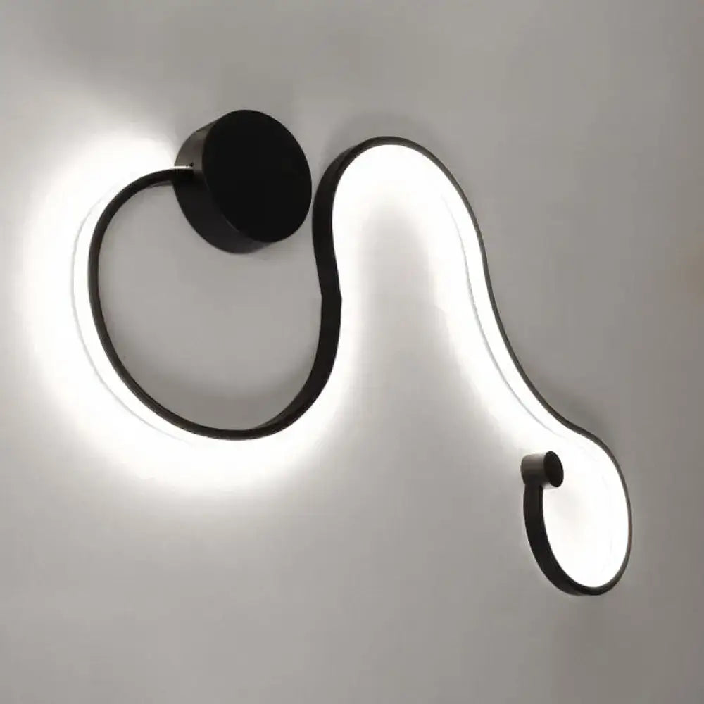 Black White Twist Sconce by Decorbites; curved LED loop with black metal frame and circular wall plate on Tampa Home & Garden Store