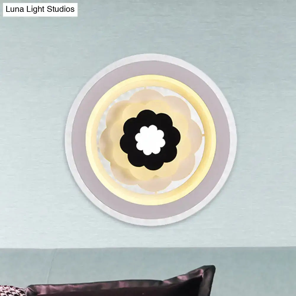 White Beige LED Sconce by Decorbites, round wall light with concentric rings and floral center on Tampa Home & Garden Store