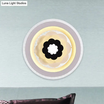 White Beige LED Sconce by Decorbites, round wall light with concentric rings and floral center on Tampa Home & Garden Store
