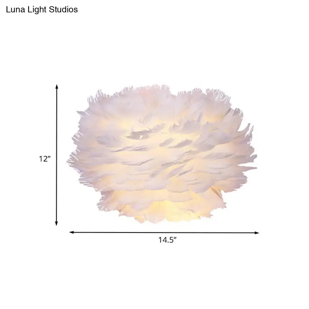 White Feather Single Bulb Sconce by Decorbites, feather shade, warm glow, 14.5in wide on Tampa Home & Garden Store