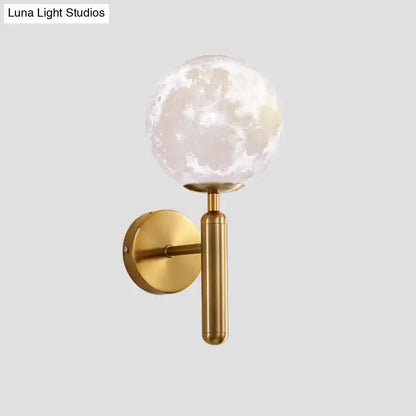 Contemporary white glass wall sconce with gold brass rod and moon globe by Decorbites on Tampa Home & Garden Store