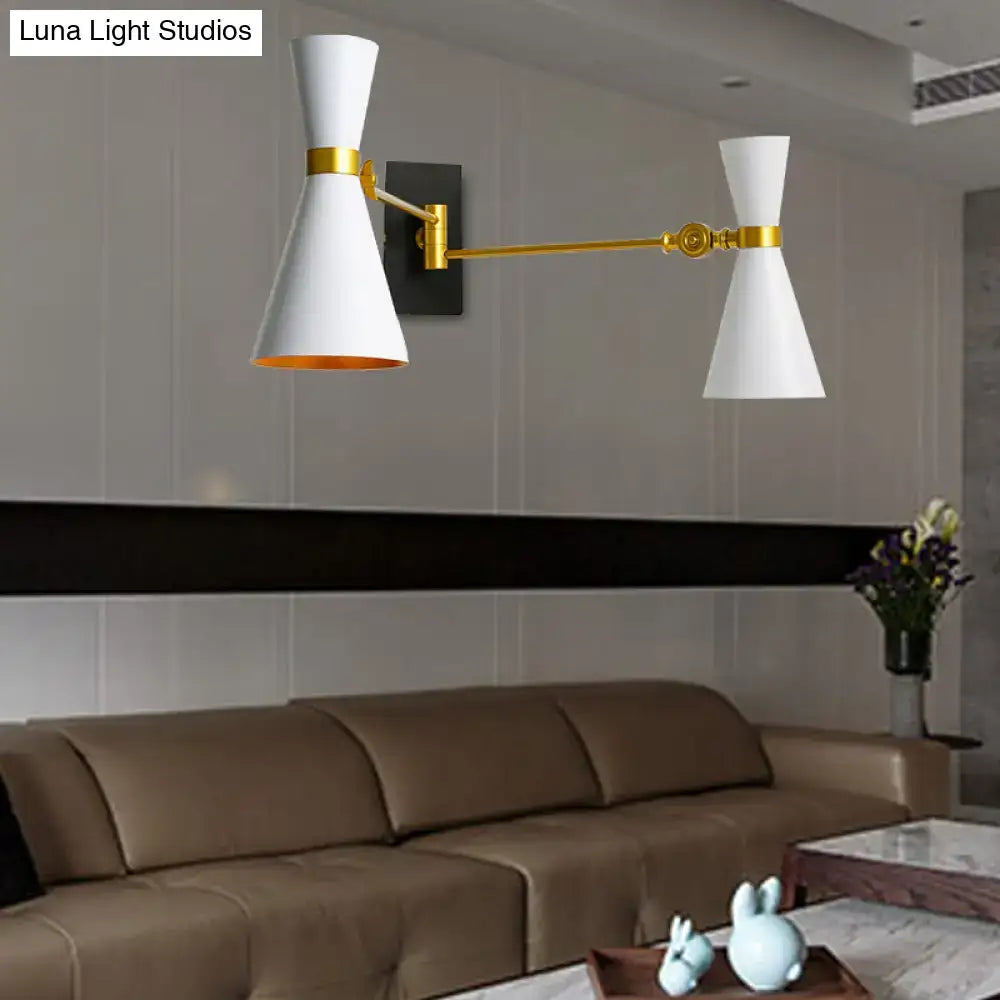 Gold adjustable arm wall sconce by Decorbites with two white cone shades on Tampa Home & Garden Store