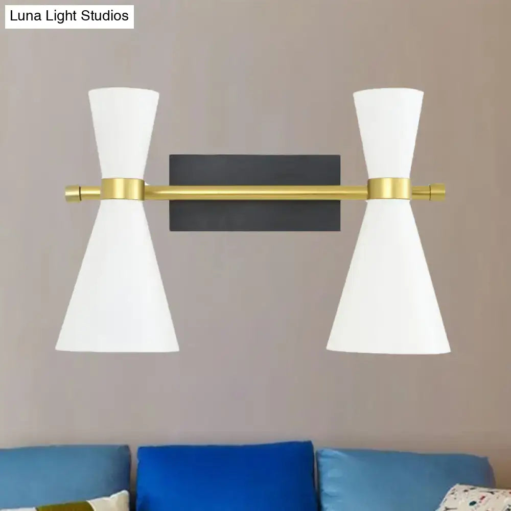 Gold adjustable arm 3-light wall sconce by Decorbites with white glass shades on Tampa Home & Garden Store