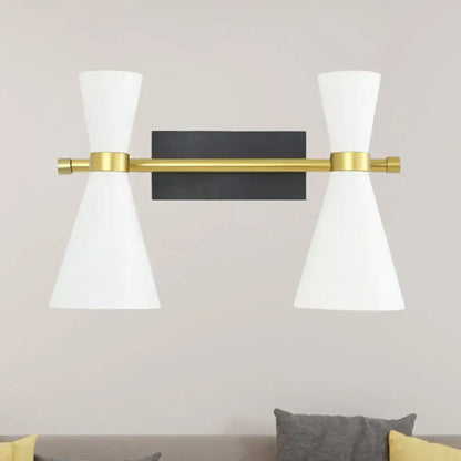 Gold Adjustable Arm 3-Light Wall Sconce with black backplate and white cone shades on Tampa Home & Garden Store