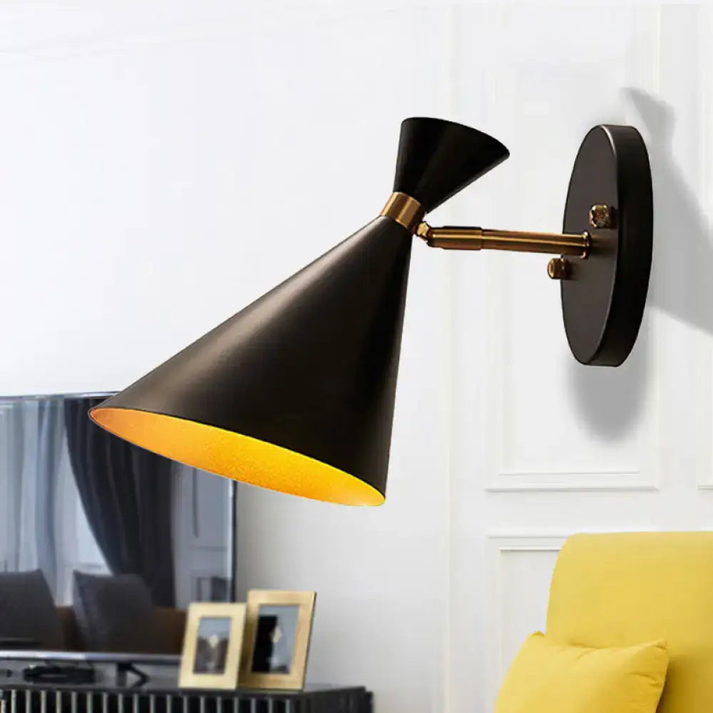 Gold adjustable arm 3-light wall sconce with black shade and brass accents on backplate on Tampa Home & Garden Store