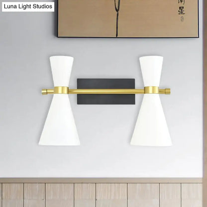 Gold adjustable arm two-light wall sconce by Decorbites with white shades and backplate on Tampa Home & Garden Store