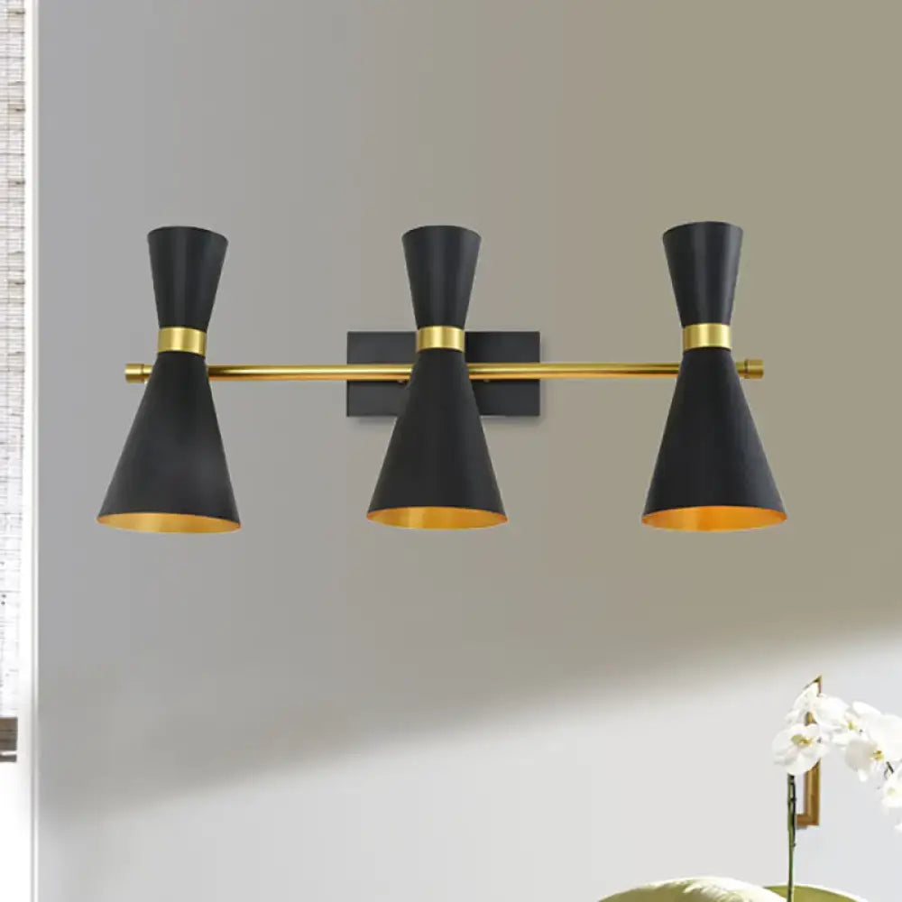Gold adjustable arm 3-light wall sconce with black conical shades and gold interiors on Tampa Home & Garden Store