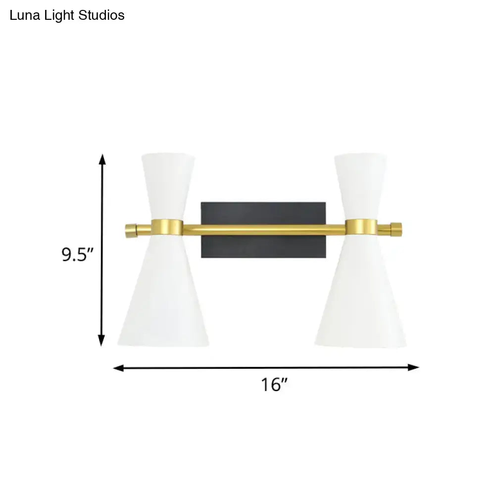 Gold adjustable arm 3-light wall sconce with a black backplate and white conical shades on Tampa Home & Garden Store