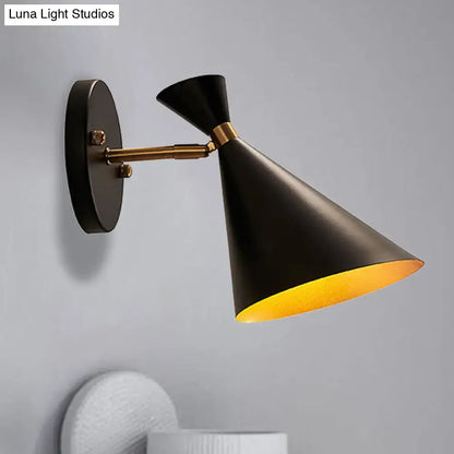 Gold adjustable arm 3-light wall sconce with black conical shade and brass mount on Tampa Home & Garden Store