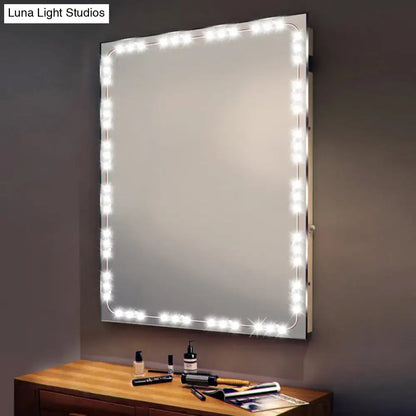 White LED Vanity Strip 118-inch length with around-edge lighting on a vanity mirror on Tampa Home & Garden Store