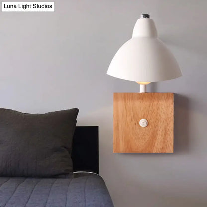 White metal wood sconce by Decorbites with white dome shade on an oak square backplate on Tampa Home & Garden Store