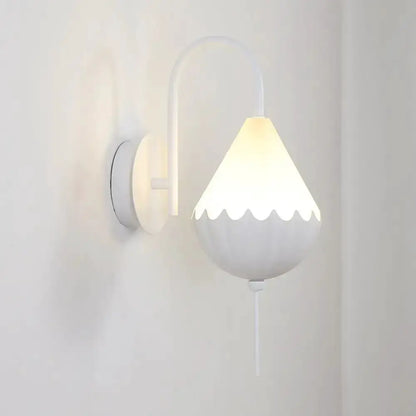 Decorbites contemporary white scalloped wall light fixture with curved arm and pull chain on Tampa Home & Garden Store