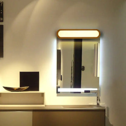 Decorbites wood LED elongated 25-inch vanity light with rounded wood frame above mirror on Tampa Home & Garden Store