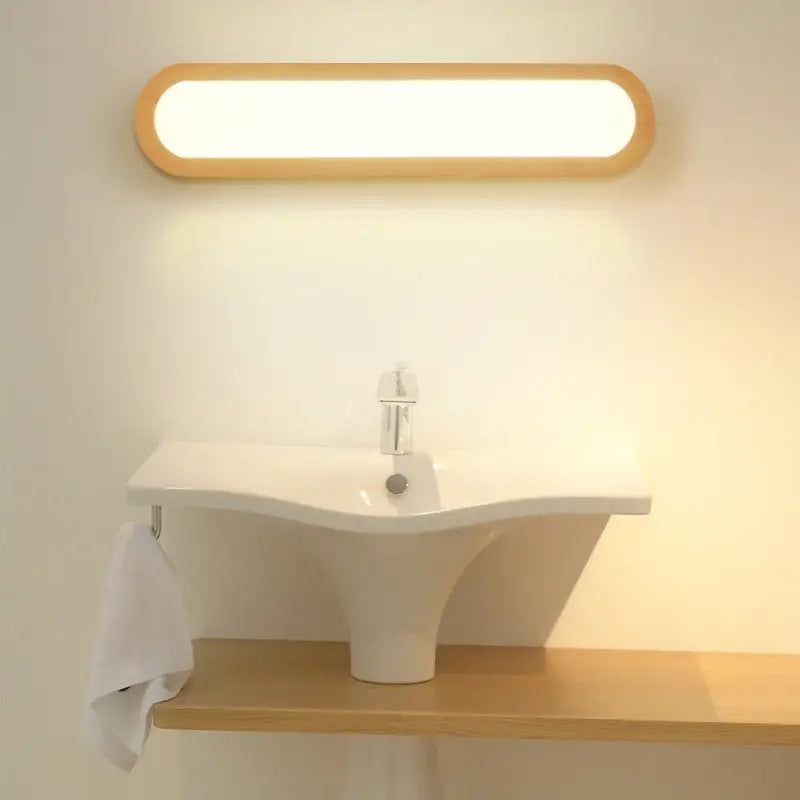 Wood LED elongated 25-inch vanity light with natural wood frame by Decorbites on Tampa Home & Garden Store