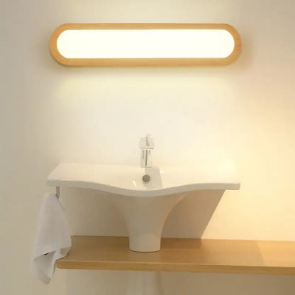 Wood LED elongated 25-inch vanity light with natural wood frame by Decorbites on Tampa Home & Garden Store