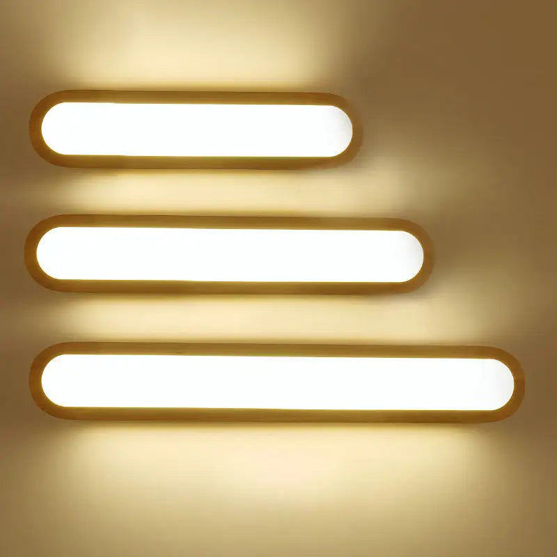 Decorbites wood LED elongated 25-inch vanity light with three warm-white bars on Tampa Home & Garden Store