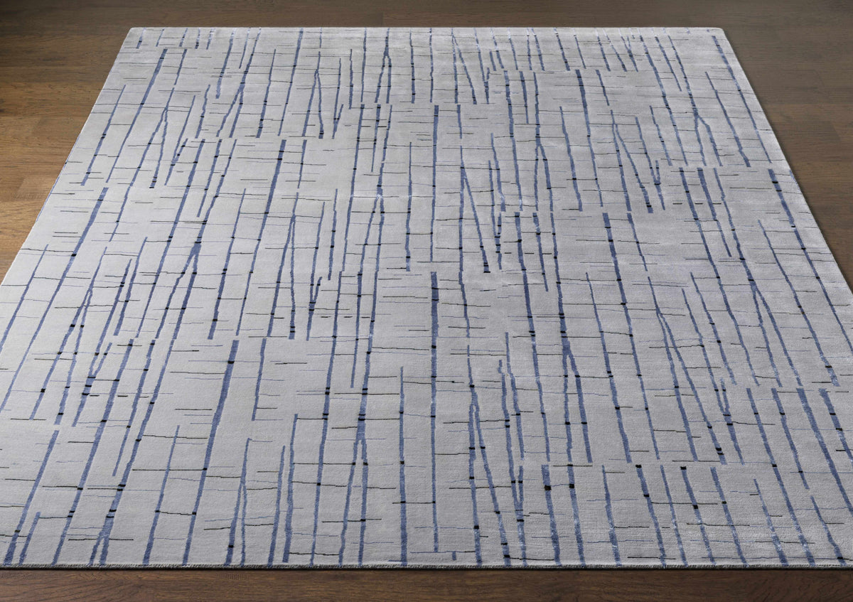 Copake Wool&Viscose Rug in light gray with blue vertical streaks, Boutique Rugs on Tampa Home & Garden Store