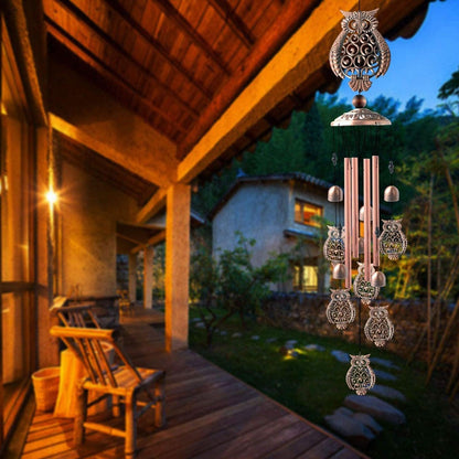 Copper outdoor wind chimes with owl ornaments and hanging copper tubes for garden decor on Tampa Home & Garden Store