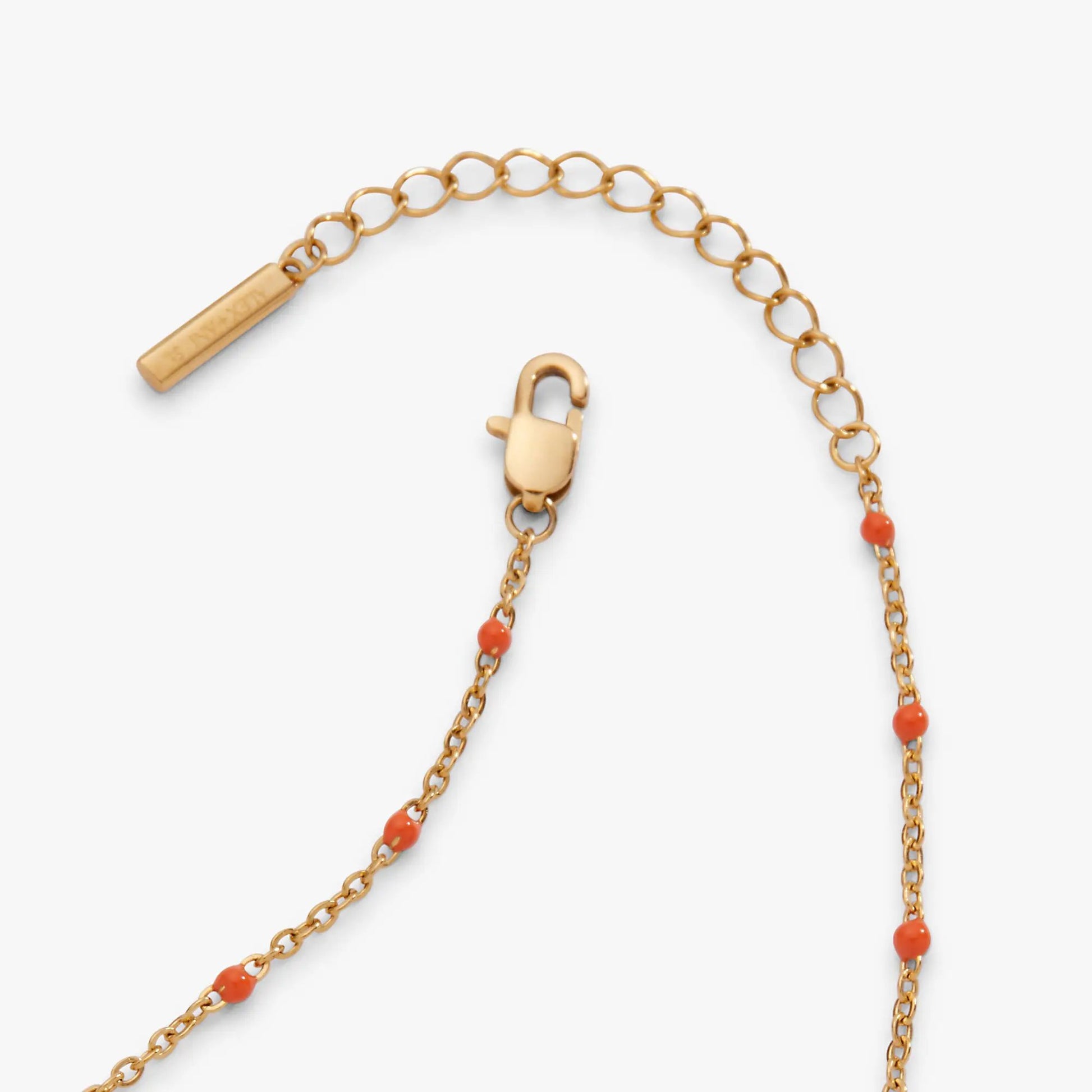 Gold-tone coral enameled chain coin station anklet with coral beads and lock charm Alex and Ani on Tampa Home & Garden Store