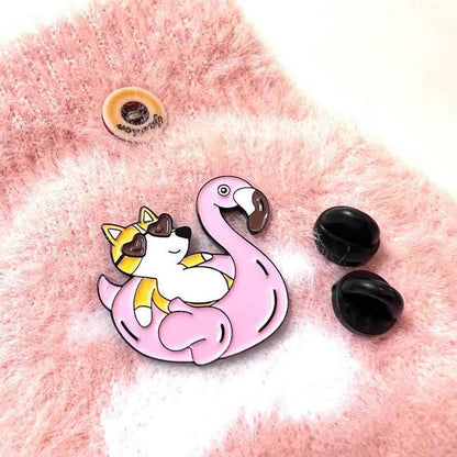 Corgi Flamingo Floatie Pin brooch pink flamingo with yellow corgi rider on background on Tampa Home & Garden Store
