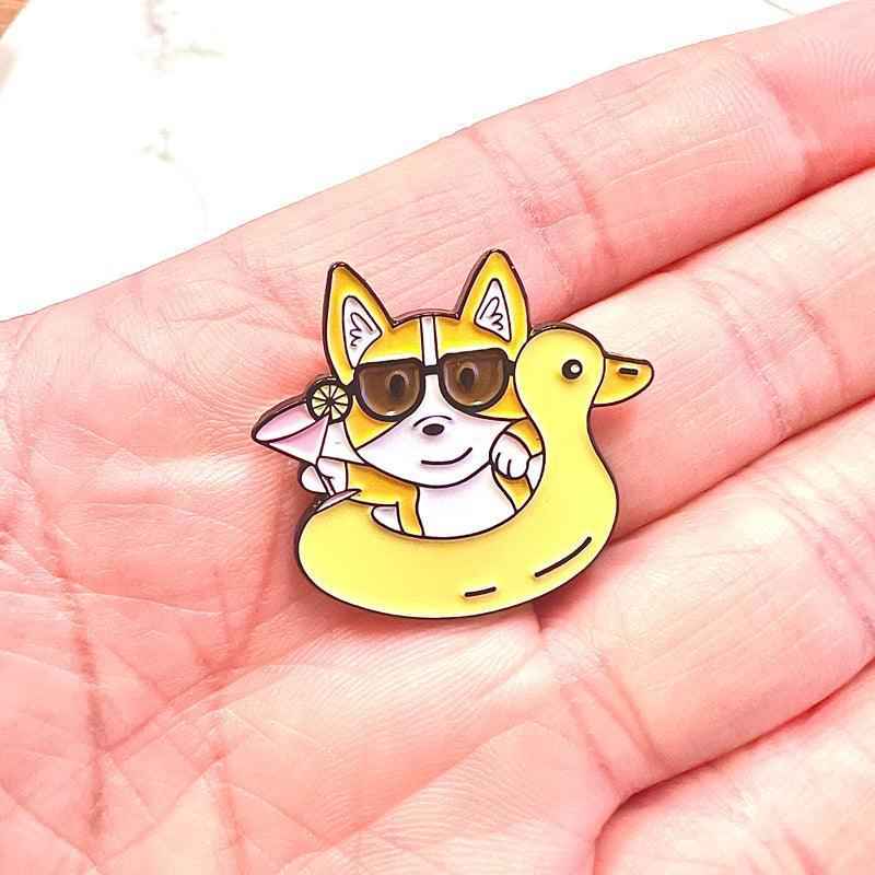 Corgi Floaty enamel pin with yellow duck floatie and sunglasses on Tampa Home & Garden Store