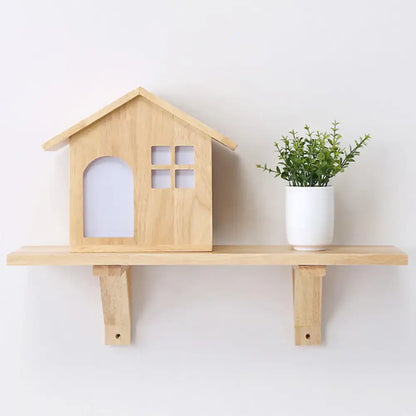 Wood Acrylic Wall Sconce by Decorbites on shelf with 2 decor items: wooden house and plant on Tampa Home & Garden Store