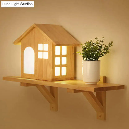 Wood acrylic wall sconce and plant on shelf; house-shaped design with warm glow by Decorbites on Tampa Home & Garden Store