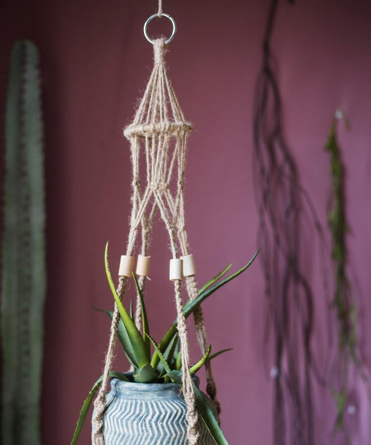 RusticReach cotton hemp planter hanger with beaded cords holds a blue zigzag ceramic pot on Tampa Home & Garden Store