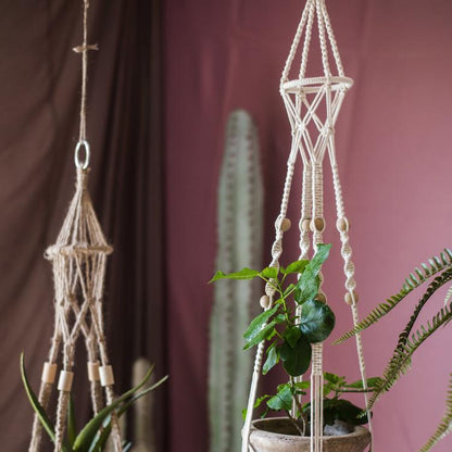 Cotton hemp rope planter hanger in cream macrame by RusticReach with two hanging planters on Tampa Home & Garden Store