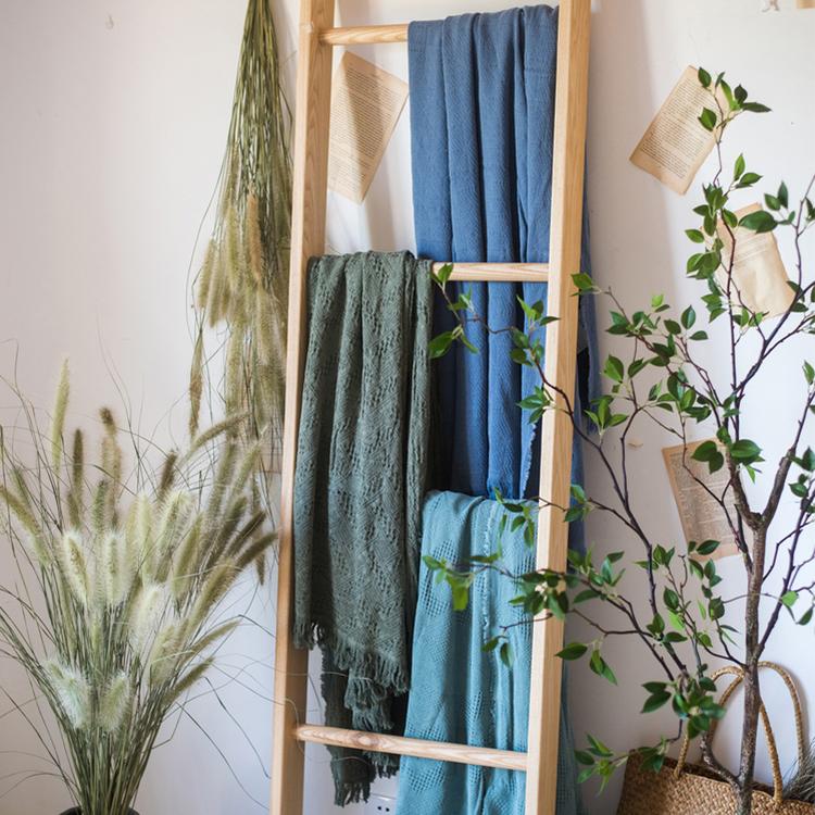 Cotton throw blanket RusticReach blue and green draped over a wooden ladder (3 blankets) on Tampa Home & Garden Store