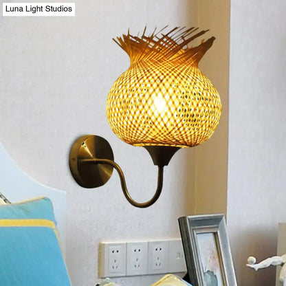Beige rattan wall sconce with woven lampshade and brass arm by Decorbites on Tampa Home & Garden Store