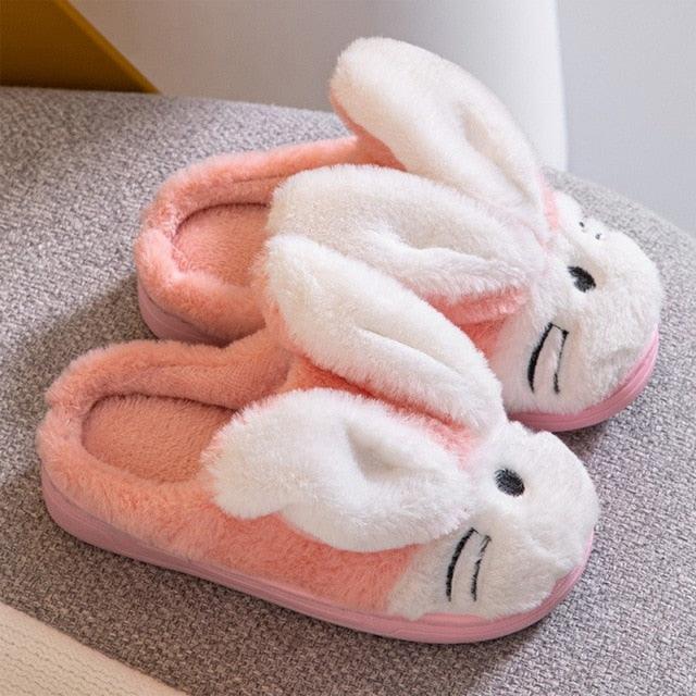 Stevvex bunny slippers pair, pink and white plush fur, cozy indoor house slippers on Tampa Home & Garden Store