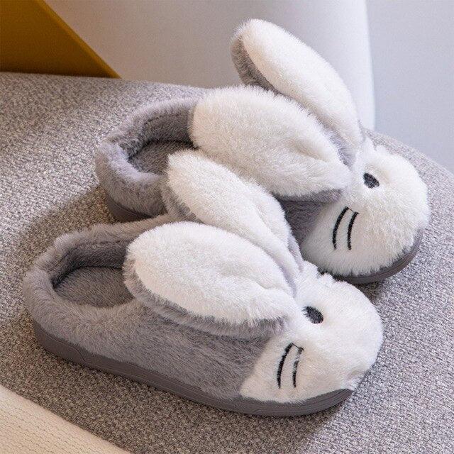 Stevvex bunny slippers pair in gray faux fur with white plush ears and anti-slip sole on Tampa Home & Garden Store