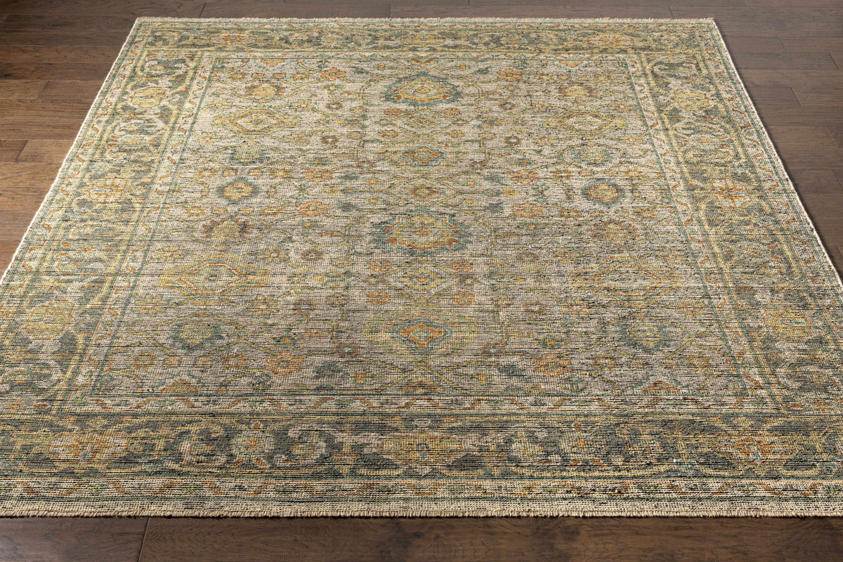 Coylton Area Rug by Boutique Rugs, distressed traditional pattern in blue gray, ivory and gold on Tampa Home & Garden Store