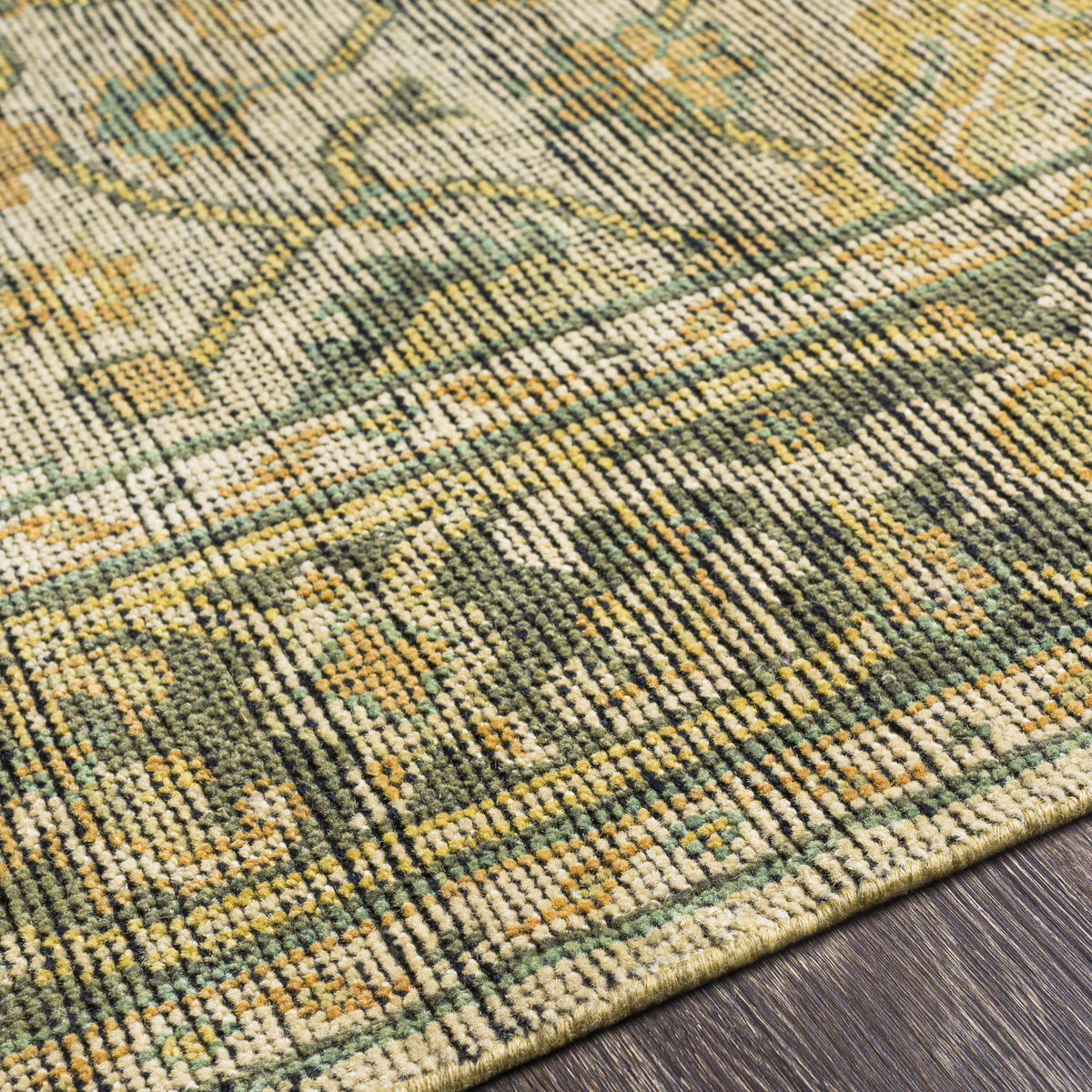 Coylton Area Rug by Boutique Rugs in green, yellow & beige woven pattern on Tampa Home & Garden Store