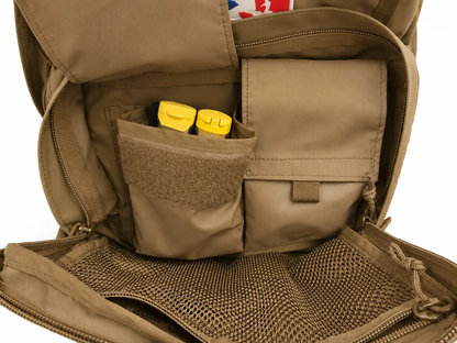 Mothman Backpack by SquatchSurvivalGear tan EDC with front pockets and yellow items on Tampa Home & Garden Store
