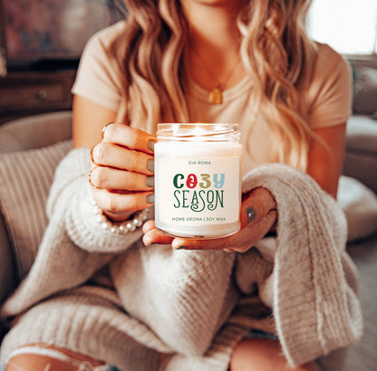 Cozy Season Candle by Gia Roma, soy wax in a clear glass jar with a white label on Tampa Home & Garden Store