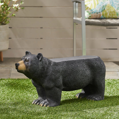 MGO Bear Bench concrete outdoor bear sculpture on grass beside patio furniture on Tampa Home & Garden Store