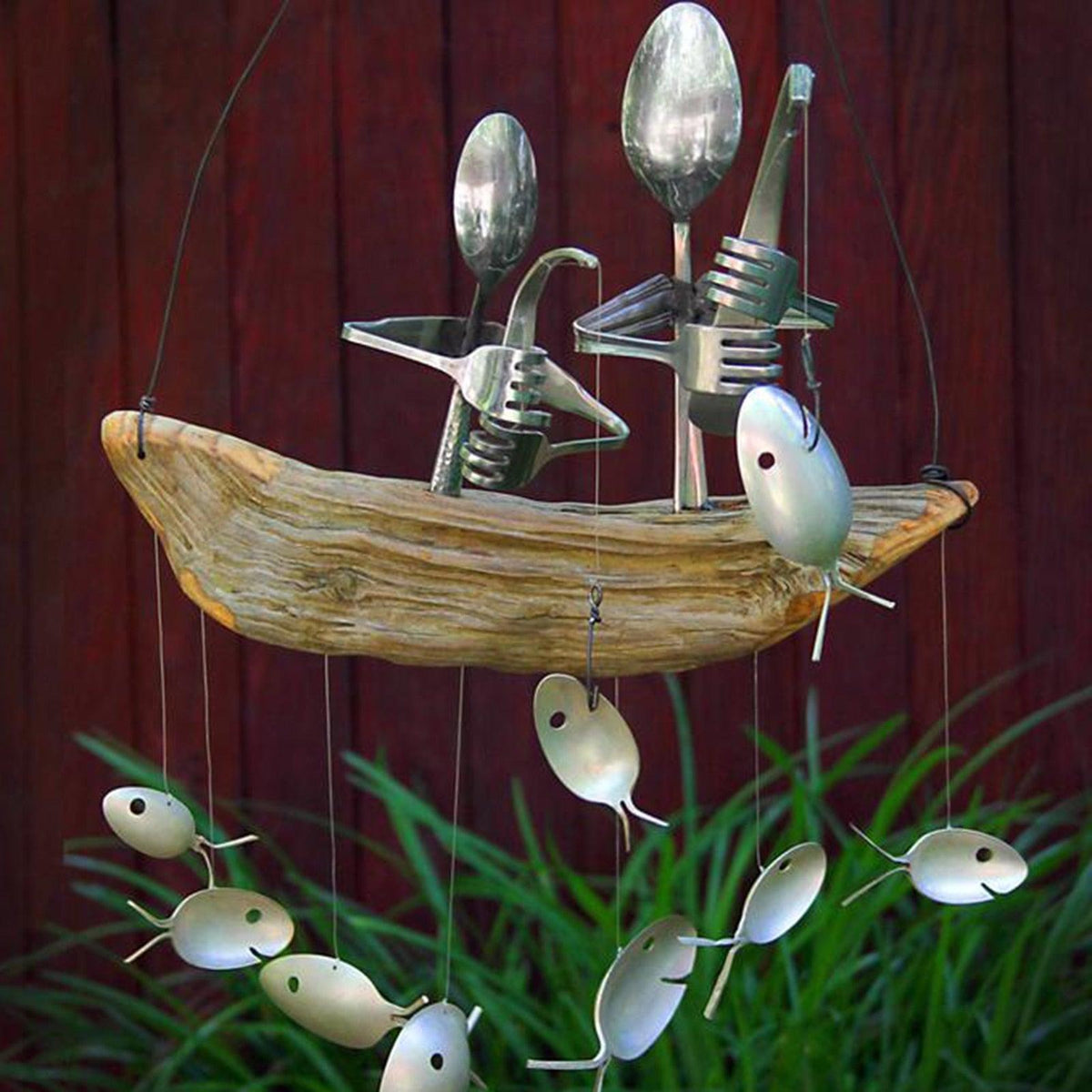Stevvex wind chime with spoon fish sculptures on driftwood and hanging round discs on Tampa Home & Garden Store