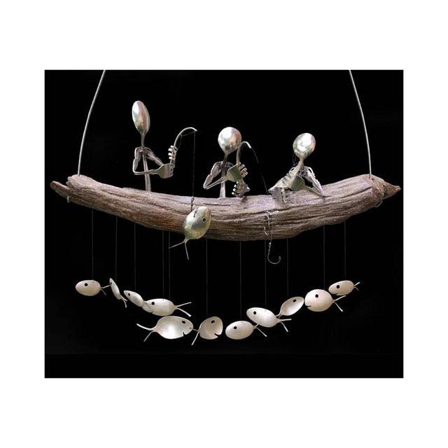 Stevvex wind chime with fishing man spoon fish sculptures on driftwood and white fish beads on Tampa Home & Garden Store