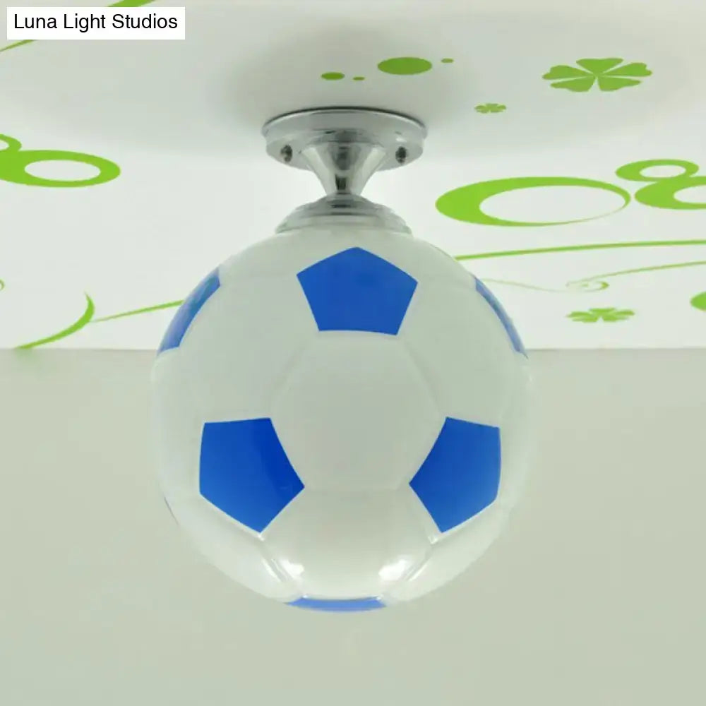 Football-shaped ceiling light, white soccer-ball sphere with blue panels, Decorbites on Tampa Home & Garden Store