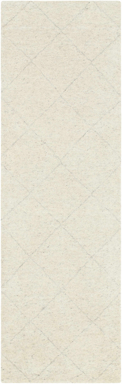 Caramoran Premium Rug by Boutique Rugs in light beige with subtle gray diamond lattice pattern on Tampa Home & Garden Store