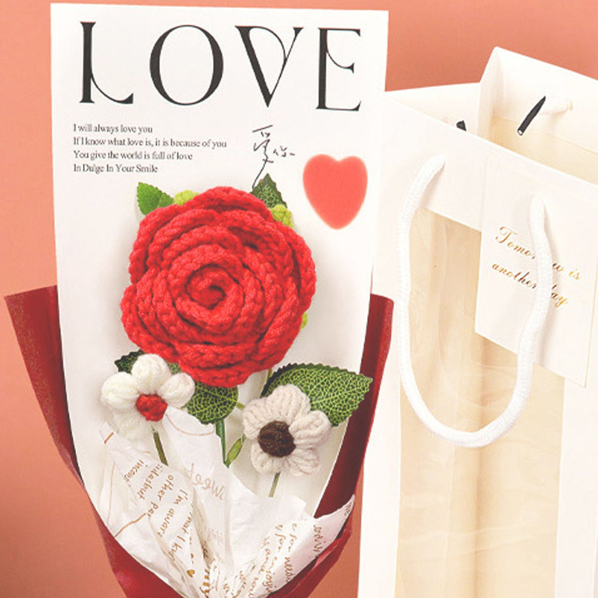 Crochet rose bouquet by Shaketea with red rose, green leaves, white wrapping on Tampa Home & Garden Store