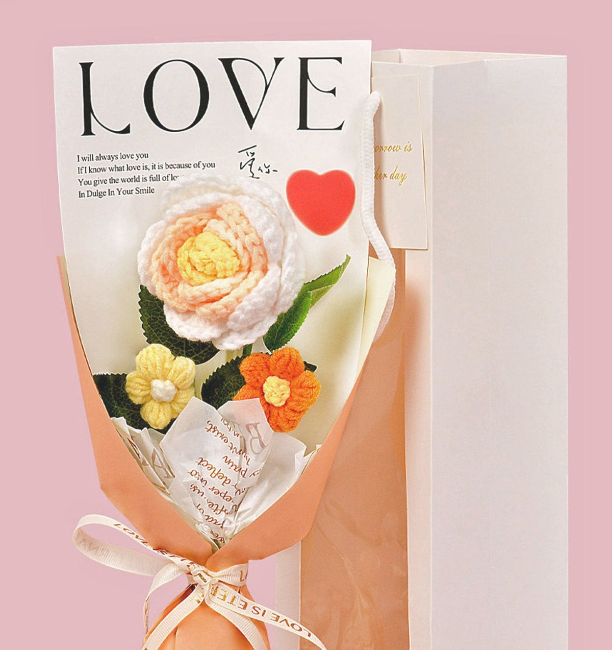 Crochet rose bouquet gift by Shaketea with peach ivory roses and green leaves wrapped in pink on Tampa Home & Garden Store