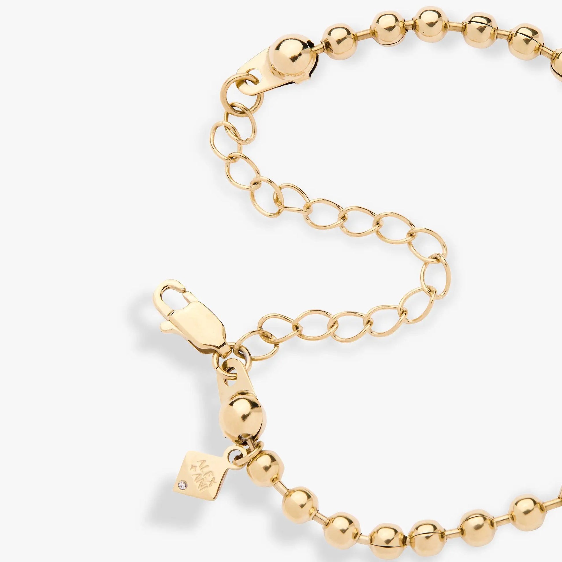 Cross Ball Chain Bracelet gold-tone with round bead links and Alex and Ani tag on Tampa Home & Garden Store