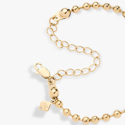 Cross Ball Chain Bracelet gold-tone with round bead links and Alex and Ani tag on Tampa Home & Garden Store