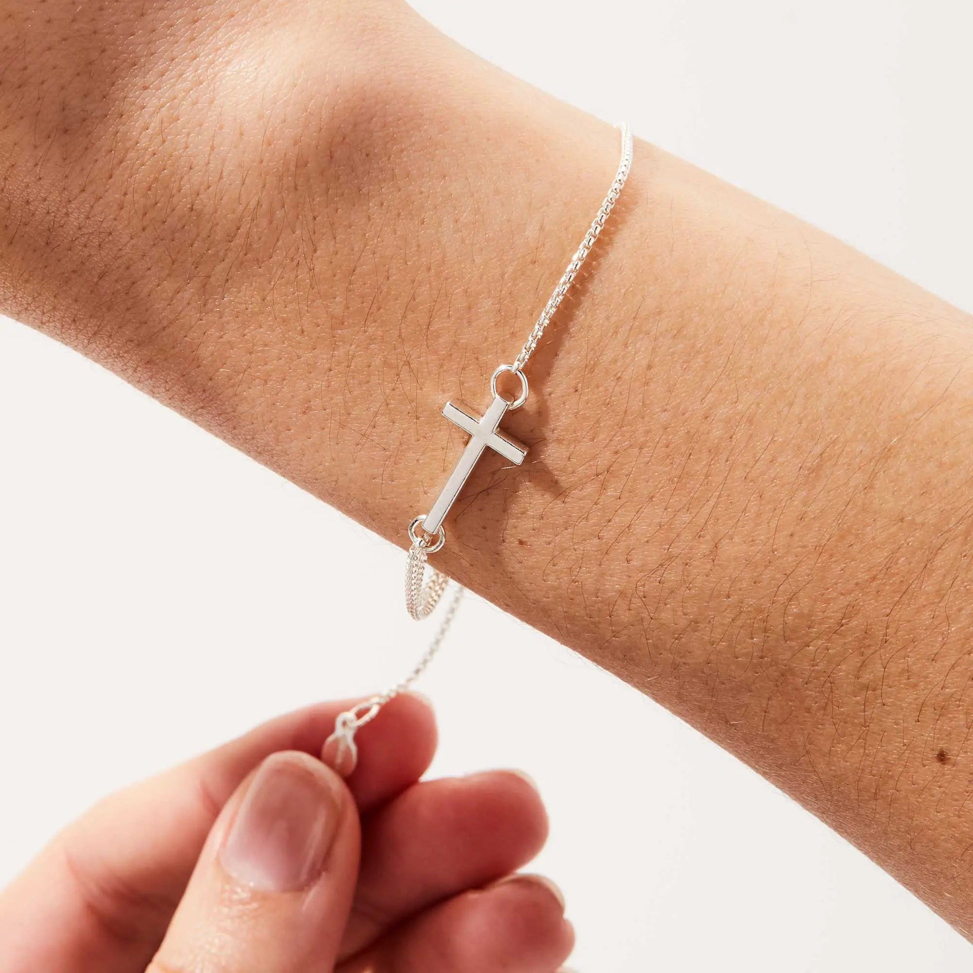 Pull Chain Cross Bracelet by ALEX AND ANI in silver on Tampa Home & Garden Store